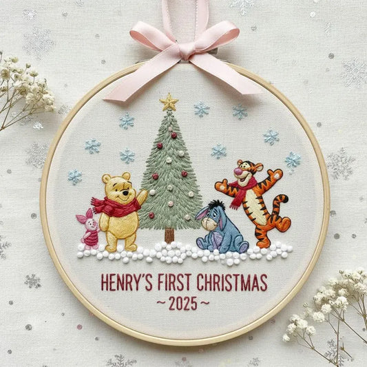 Celebrate your little one’s first holiday with this Baby’s First Christmas Classic Pooh Embroidered Hoop