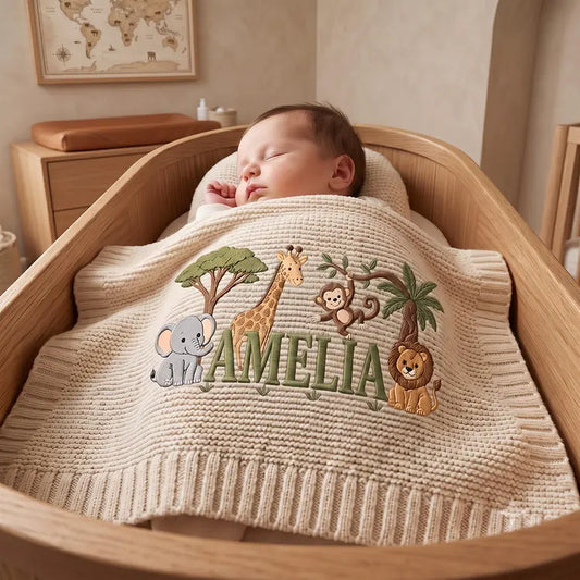 Cream Safari Baby Blanket In Crib