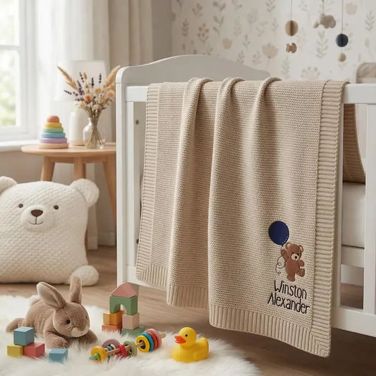 Beige Personalized Baby Blanket On Nursery Crib