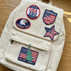 Five USA 250th Anniversary Embroidered Patches On Canvas Backpack