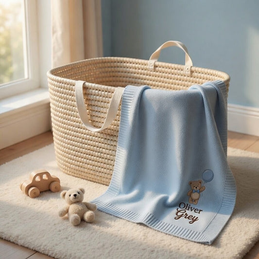 Light Blue Balloon Teddy Blanket Draped Across Woven Basket