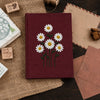 Maroon Daisy Notebook Displayed With Vintage Letters And Stamps