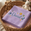 Purple Daniel Cosmic Blanket Folded Inside Wicker Basket