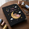 Black Moon Bear Notebook Surrounded By Pastel Thread Spools