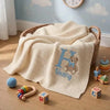 Cream Personalized Baby Blanket In Nursery