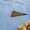 Closeup Blue Mineral Wash Tee With Custom University Pennant