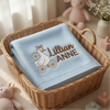 Light Blue Lillian Anne Blanket Folded Inside Woven Basket