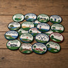 Golf Club Souvenir Badges Gathered On Rustic Wooden Boards