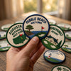 Hand Holding Augusta Pebble Beach And Pinehurst Golf Designs