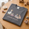 Grey Goose Graphic Shirt Styled With Wooden Nursery Toys