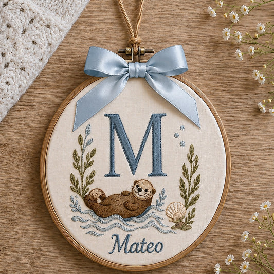 Custom Otter Initial Ornament With Blue Bow And Name