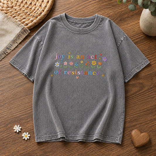 Grey Joyful Wildflower Shirt Displayed On Wooden Table