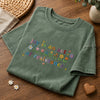 Folded Moss Green Joy Is An Act Of Resistance Floral Tee