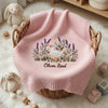 Pink Personalized Goose Blanket Displayed With Nursery Toys