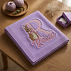 Purple Monogram Bunny Baby Blanket On Table