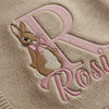 Close Up Of Bunny Initial Machine Embroidery On Knit Blanket