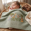 Mung Bean Safari Baby Blanket In Wicker Basket