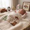 Cream Cowboy Baby Blanket In Nursery
