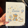 Sunlit Beige Lucas Notebook Held Inside A Car