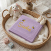 Purple Personalized Embroidered Baby Blanket In Moses Basket