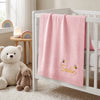 Personalized Pink Embroidered Baby Blanket On White Crib