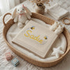 Cream Personalized Embroidered Baby Blanket In Moses Basket