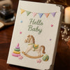 Beige Hello Baby Keepsake Decorated With Embroidered Nursery Toys