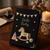 Black Rocking Horse Notebook Displayed In Warm Candlelight