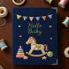 Navy Baby Journal Featuring Toys And Celebration Bunting