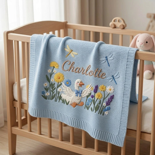 Light Blue Goose Blanket On Crib Rail