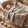 Beige Teddy Bear Baby Blanket In Bassinet