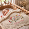 Cream Wildflower Baby Blanket In Nursery Crib