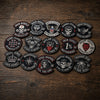 Ride Free Biker Patches Grouped On Weathered Wooden Boards