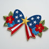Close-Up Patriotic Floral Bow Embroidered Patch On Fabric