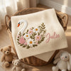Cream Julie Swan Blanket Styled With Plush Nursery Toys