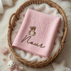 Pink Noor Teddy Blanket Displayed With Plush Bunny