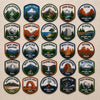 Scenic American Hiking Emblems Featuring Mountains Deserts And Coastlines
