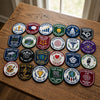 Colorful Campus Club Insignias Displayed Across A Sunlit Table